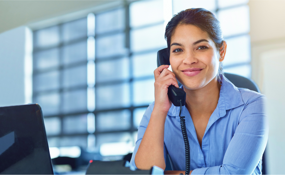 Businessperson-calling-customer-from-landline-number
